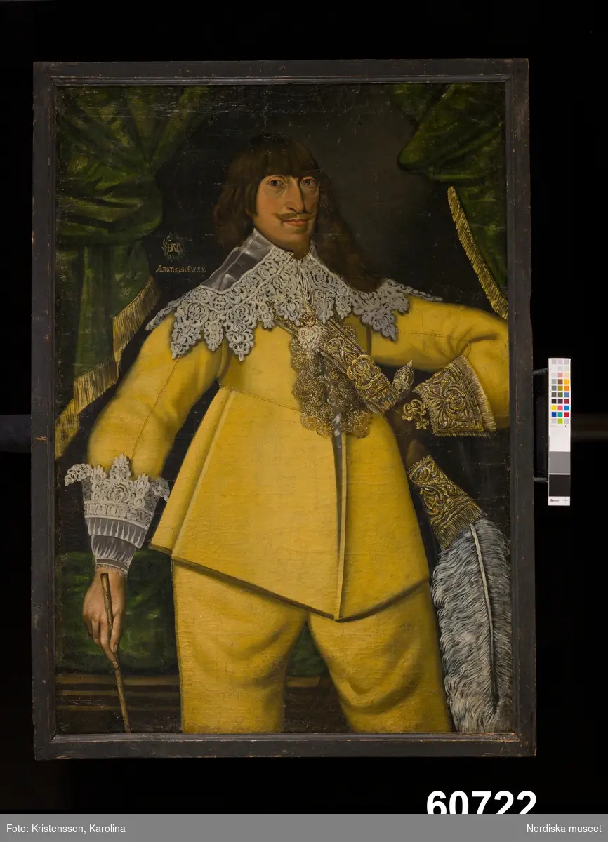 Herrporträtt, knästycke, kyller och byxor av gult skinn, spetskrage.