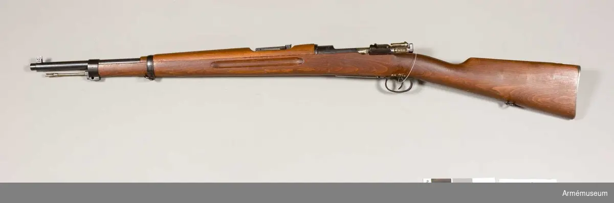 Grupp E II.
6,5 mm gevär m/1938, system Mauser, utan bajonett.