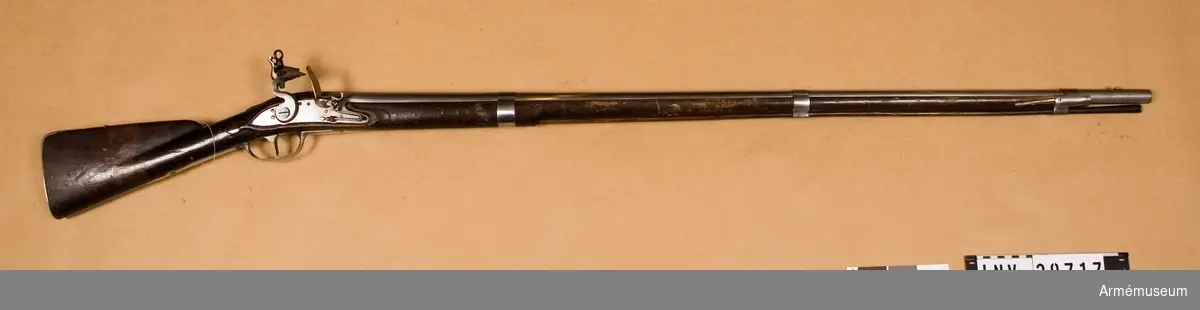 Grupp E II b.
Musköt med flintlås.
Sverige 1730-40-talet. Försöksgevär tillverkat i Jönköping efter förebild av det franska geväret m/1728.
