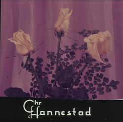 Bukett med tre gule roser og bladgrønt, brukt som kinoreklam