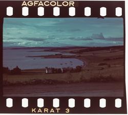 Bildet Viser Alstadhaugbukta. Et godt stykke øst for holsand