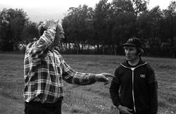 Landskap med person(er).