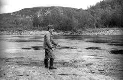 Landskap med person(er).