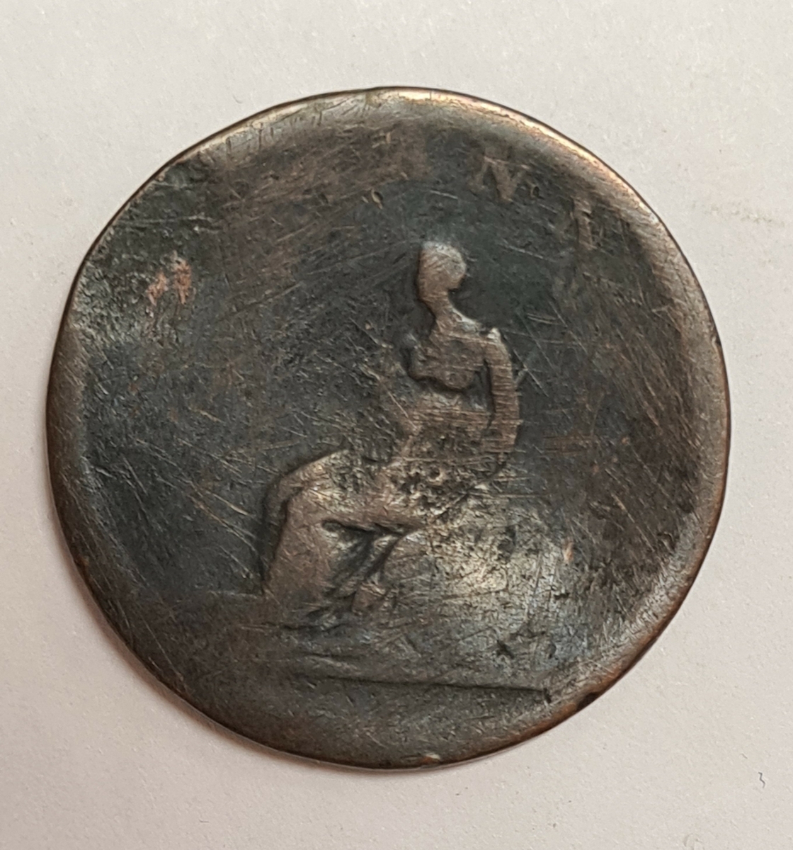 Tre mynt från Storbritanien.
½ Penny, 1806
½ Penny, 18?
½ Penny, 1806