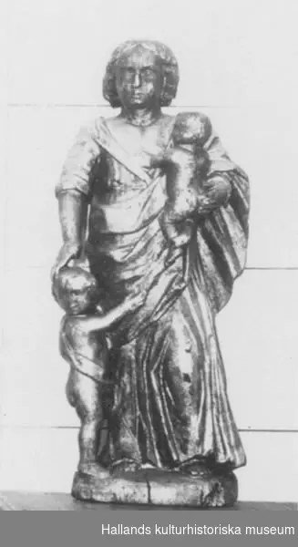 Figur från altaruppsats, träskulptur, "Kvinnlig Dygd". Bronserad. Från 1700-talet.
