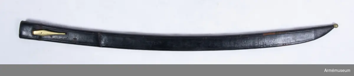 Grupp D II
1816-71.
Baljan är helt av svart läder samt har en koppelhake av mässing. Doppskon av mässing och döljs till större del av lädret, endast  den nedre kulformningsdelen är synlig. På koppelhaken förekommer  siffran 7.