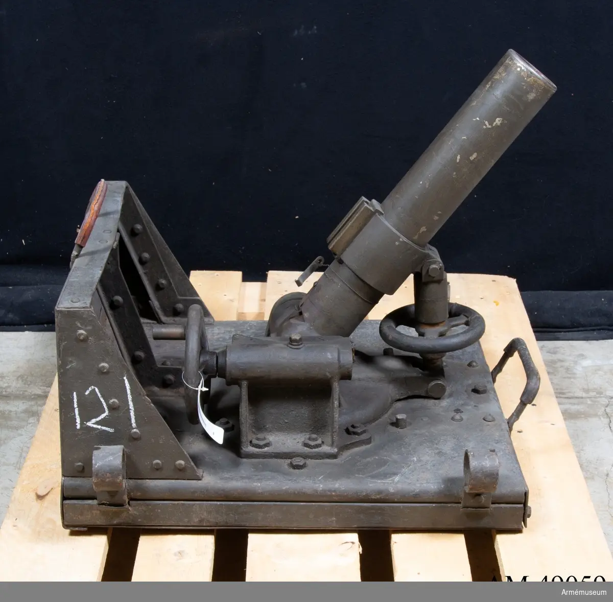 Grupp E X.                                                                  
Samhörande med 6 cm granatkastare m/1918 är avfyringslina med 2 block, 4 st krampor, 4 st bäddningspålar, bäranordning, transportskydd, 2 st bärselar, 2 st bärstänger,  eldriktningsskärmar, stagrör, 4 st pinnar, mynningsfodral, nyckel till lagerhylsa, höjdriktinstrument, sidriktinstrument,  viskare.