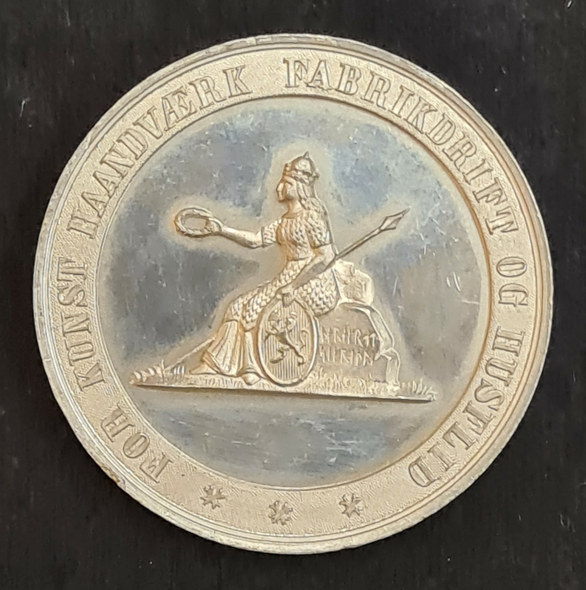 Medalj från Industriutställningen i Drammen, Tyskland år 1873.