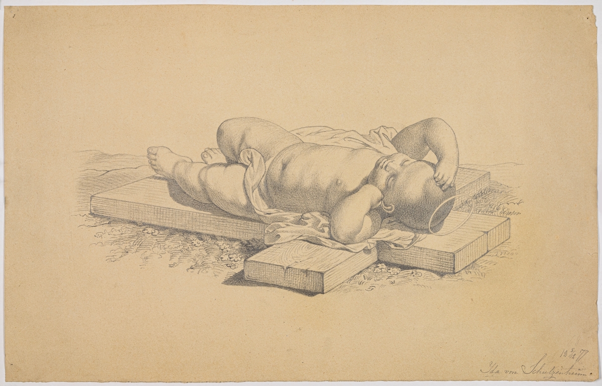 Teckning på papper, vilande barn med gloria, på kors. Signerad Ida von Schulzenheim 5/12 1877.