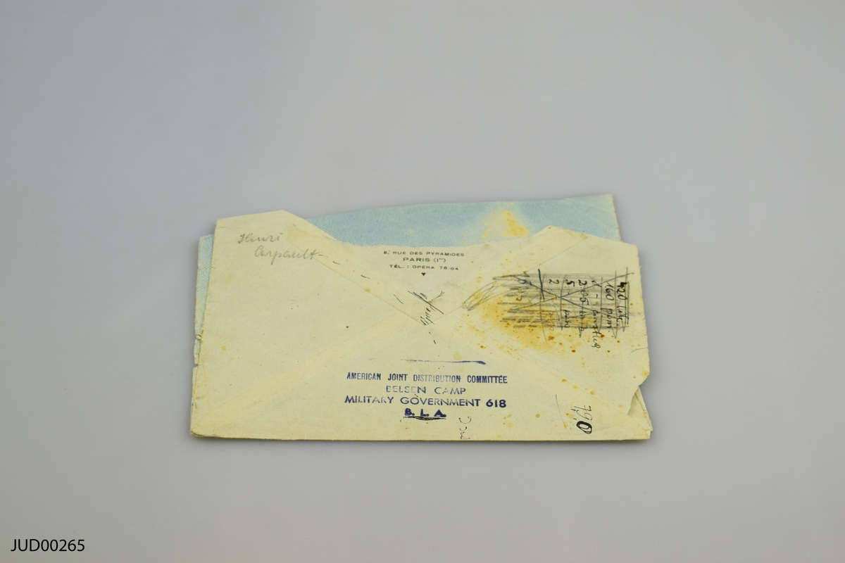 Kuvert innehållande fyra olika dokument:
1. Växlingskort för vetemjöl och bröd. 
2. ID-lapp. 
3. Reklamblad. 
4. Text om "judeproblemet".