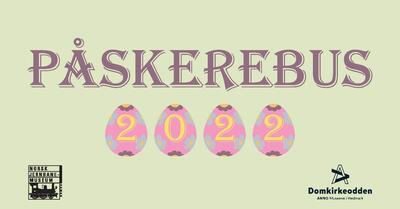 Påskerebus står med snirklete bokstaver, 2022 står i fire påskeegg - ett tall i hvert egg.. Foto/Photo