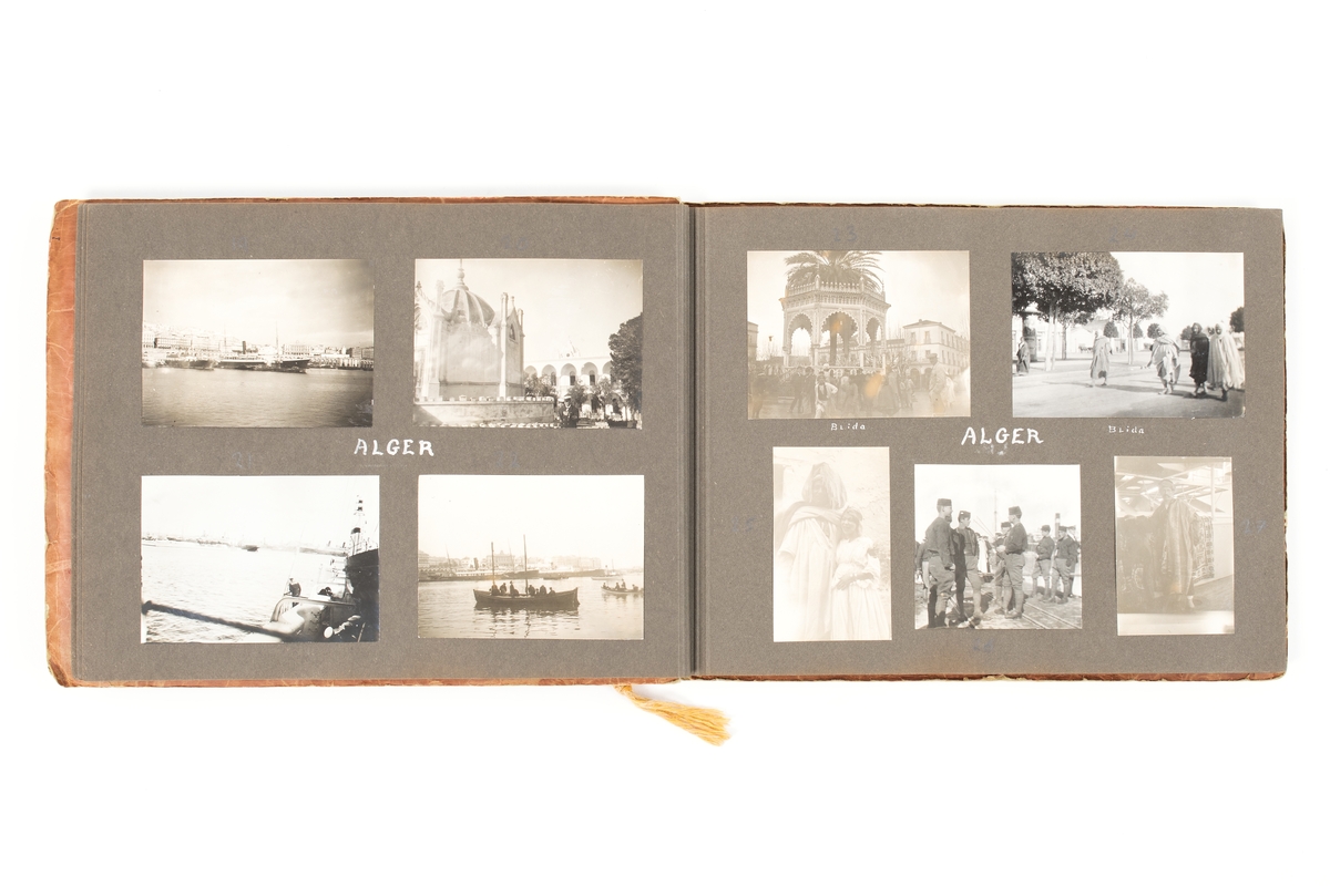 Ett fotoalbum med bilder från pansarkryssaren Fylgias långresa 1920-21.