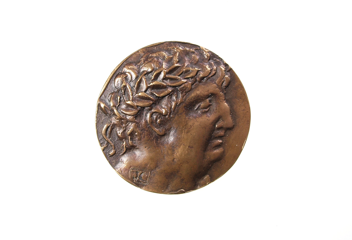 Motiv advers: Keiser Nero, laurbærkranset, i profil mot høyre.