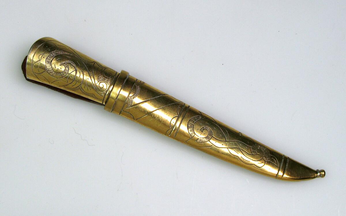 Knife made by Nicolai Johansenin brass, embellished with acantus tramlings.