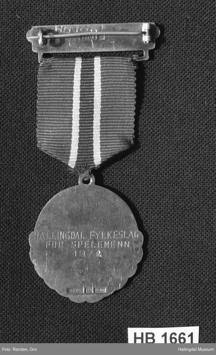 Medalje for felespill.
