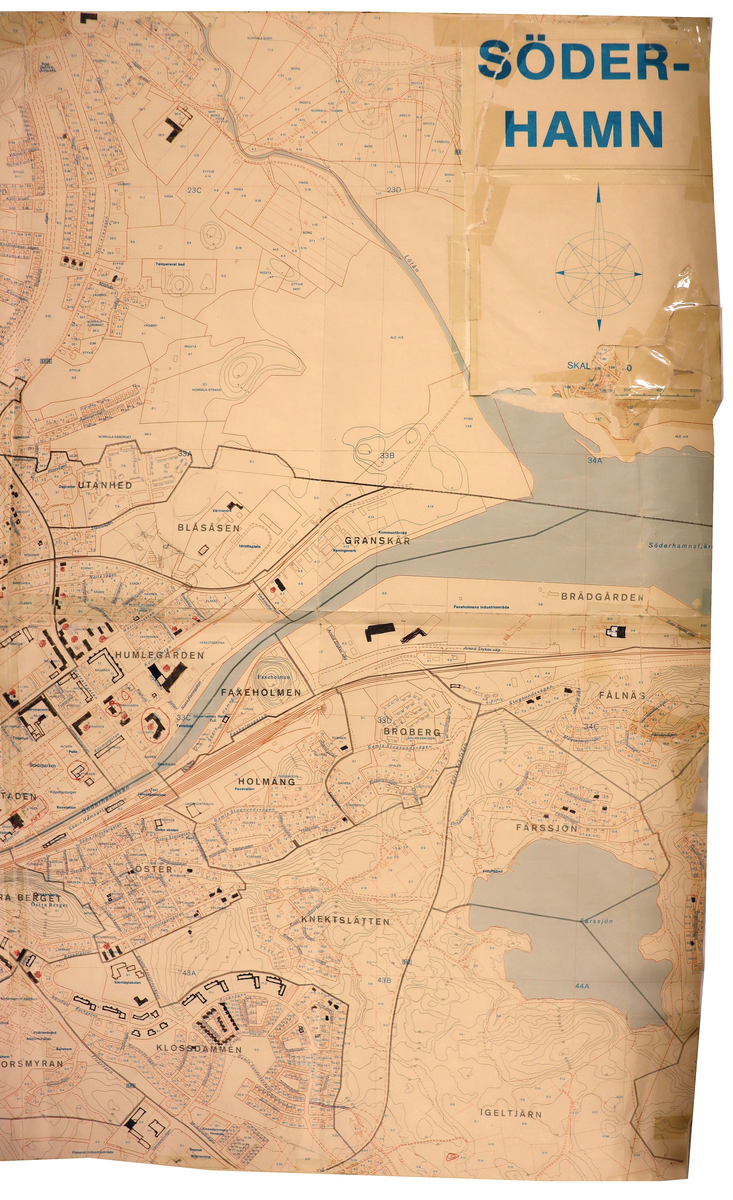 Karta över Söderhamn där byggnader och kvarter ritade av Heino Krabu markerats.