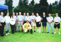 Gruppe med golfspillere i Vancouver. Mannen med genser på ar