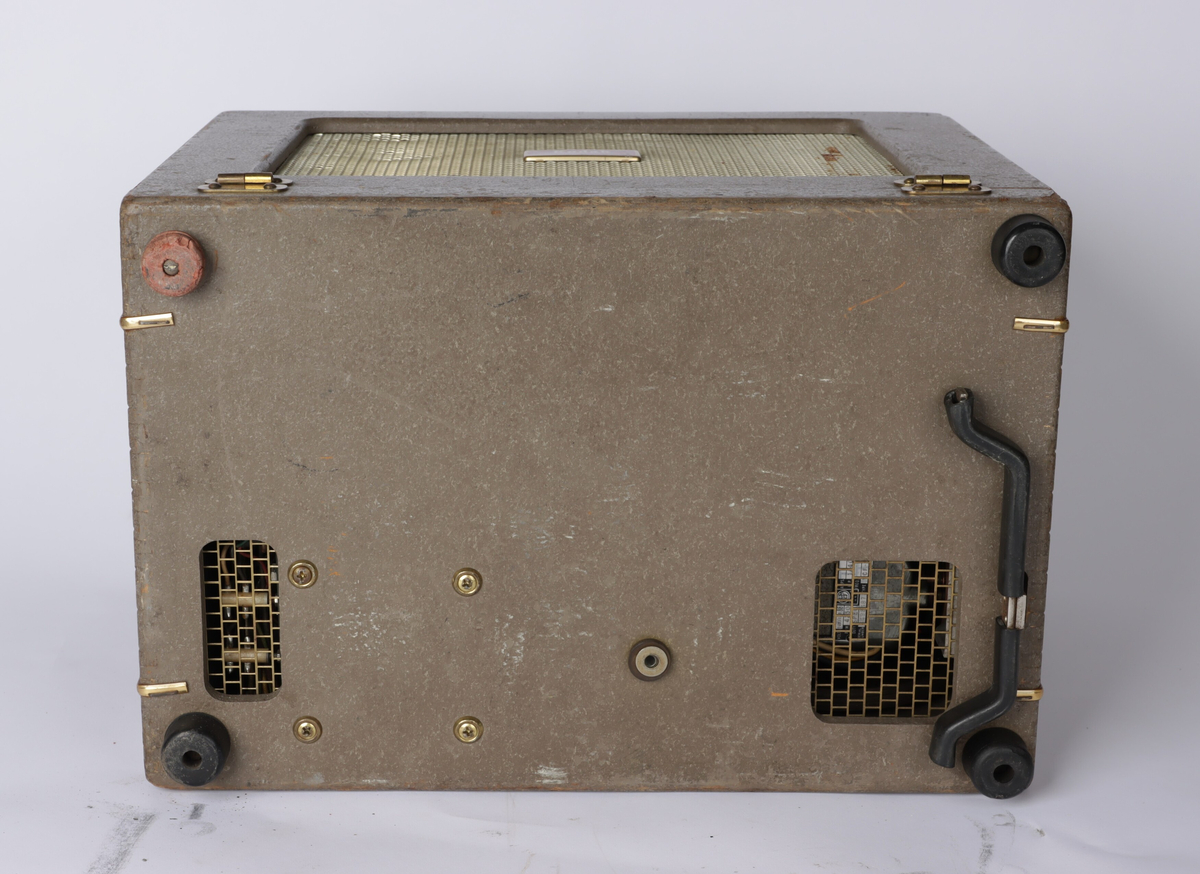 Fremviser/prosjektor fra Kodak bygd inn i en kasse av lakket komposittmateriale. Kassen har låser på hver side slik at den kan åpnes og sidepanelet fjernes. På toppen av kassen er det to hanker for å bære.