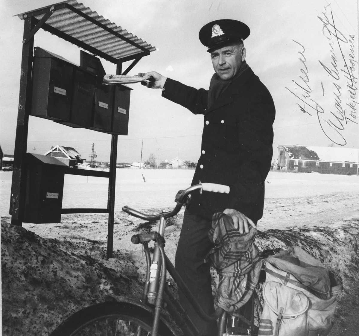 Postmann med sykkel.
