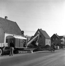Antatt Oslo. Boliger, vei og gravemaskiner.