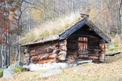 Badstugu i øvre Døkki, Dokken gård i Sudndalen