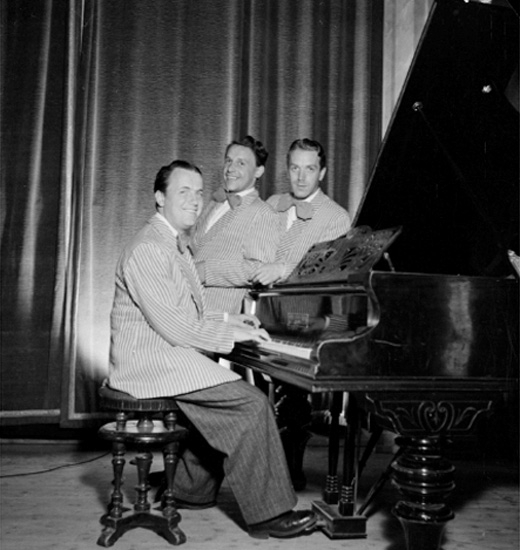 Österbergs trio, tre män vid pianot.