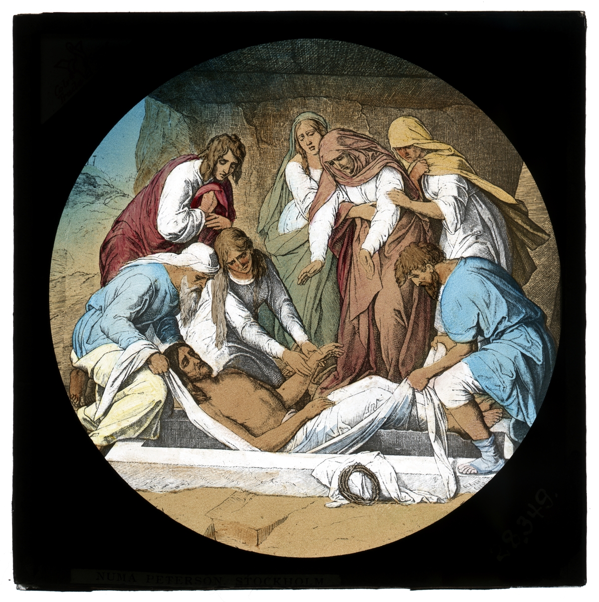 Målad bild på glas för Skioptikon/Laterna magica.
"The Burial of Christ".