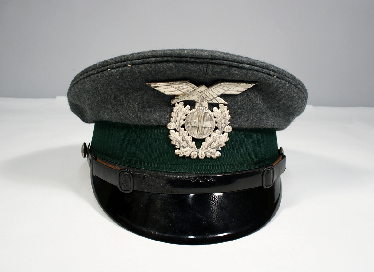 Skarven
Den tyske ørn
Politimerke
Ekeløvskrans
Solkors