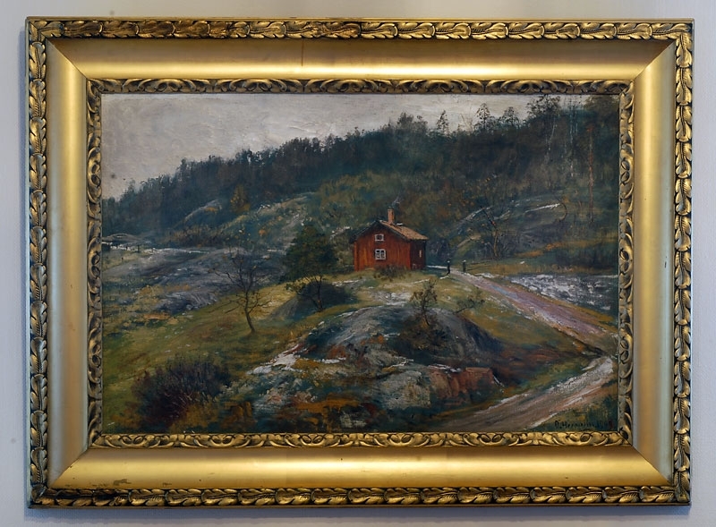 Enligt liggaren: Landskapsbild, signerad: O Hermelin 1909. Inramad i bred guldram.