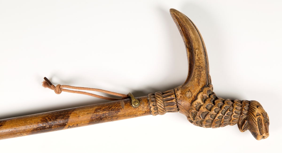 Håndtak skåret som fugl