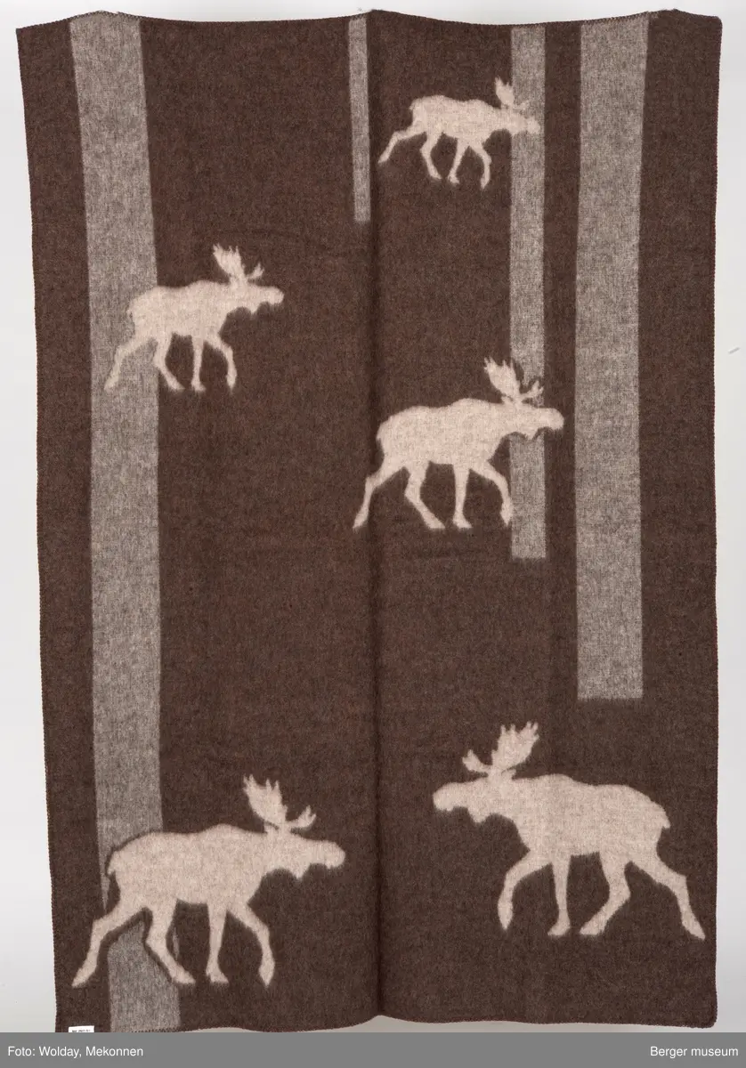 Elg. Langsgående bred linje som fungerer som en slags innramning av hovedmønster