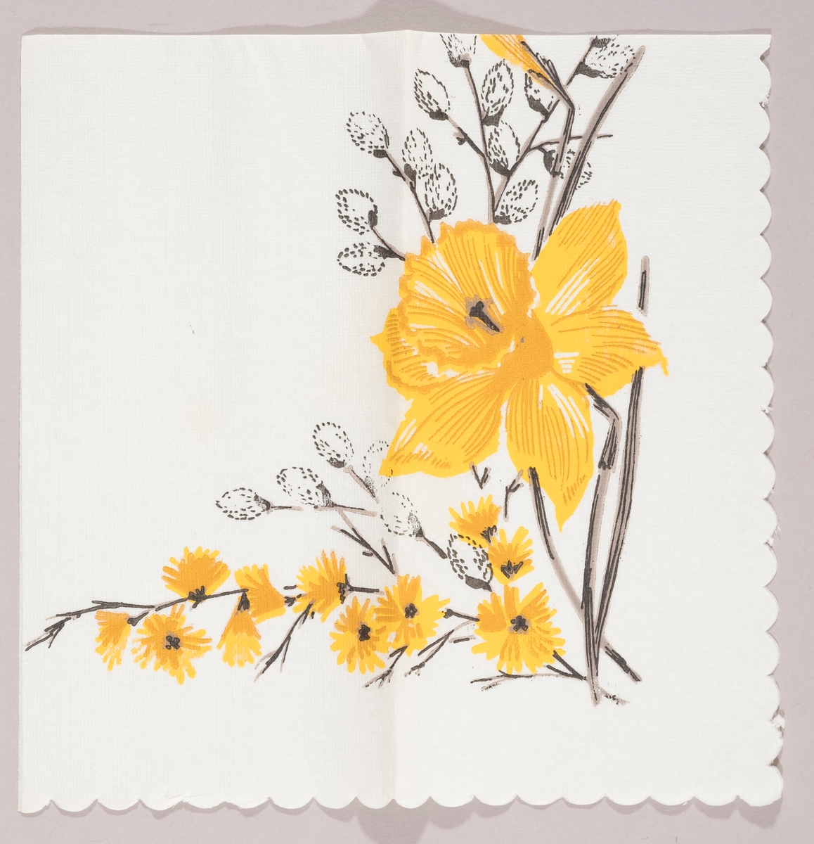 En påskelilje og grener med "gåsunger" og gule blomster