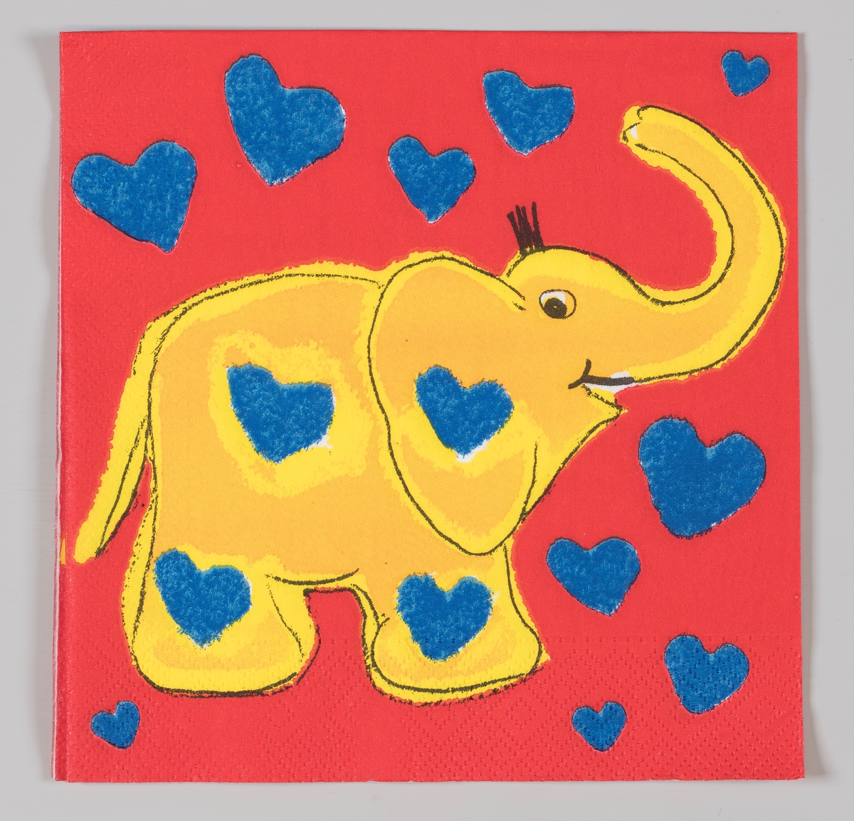 En gul elefant med blå hjerter