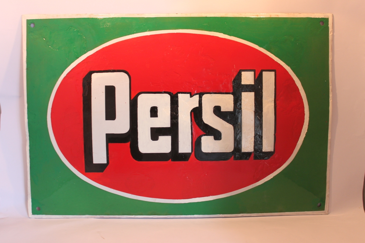 Emaljerad reklamskylt för tvättmedlet Persil. Persil började säljas 1907 och tillverkas av firman Henkel och Unilever.