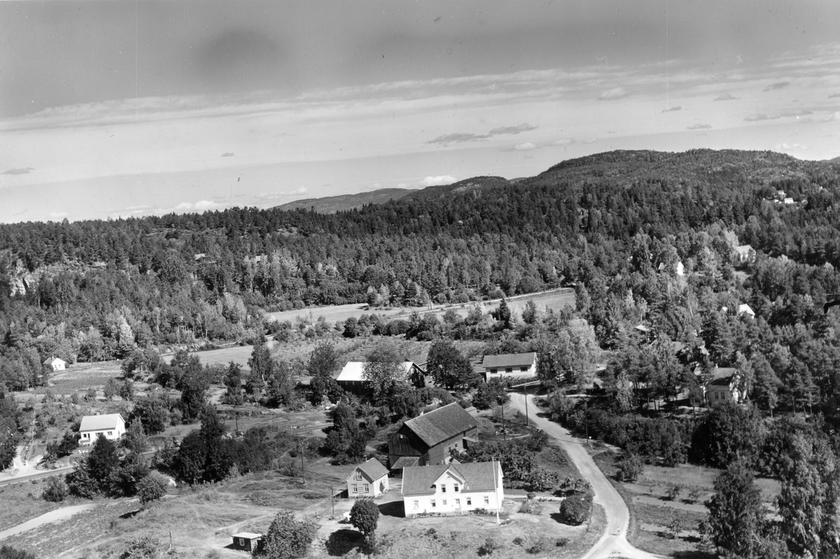 Flyfotoarkiv fra Fjellanger Widerøe AS, fra Porsgrunn Kommune. Skjelsvik. Fotografert 08.08.1959. Fotograf J Kruse