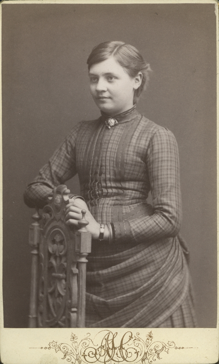 Kvinna, 1885.