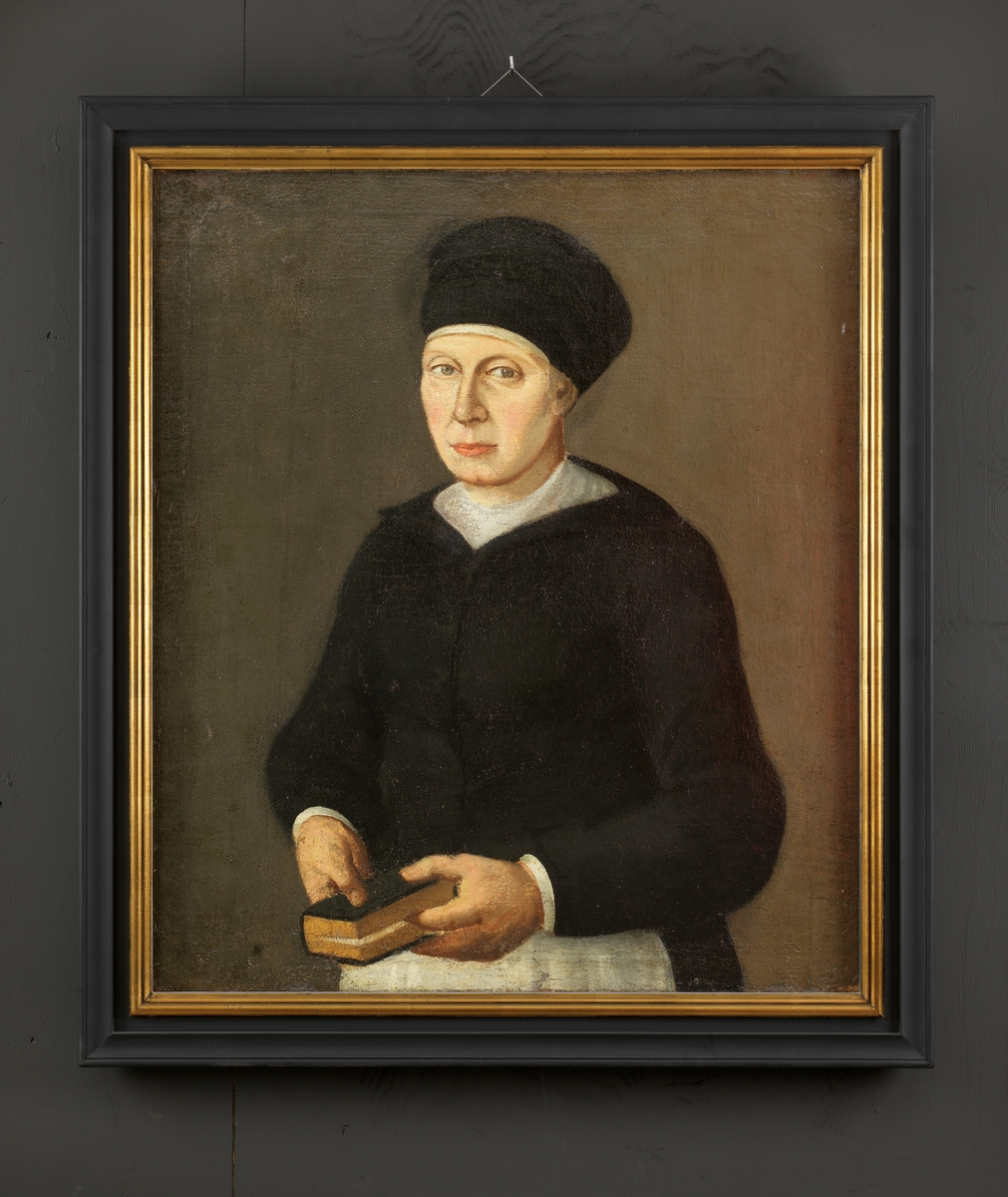 Brystportrett av svartkledd kvinne med bok i hånden. Trolig Maren Michelsdatter Stub, prost Kjeld Stubs 3. hustru.
