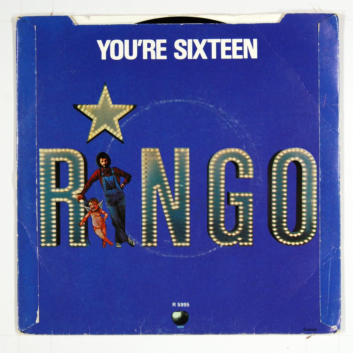 Coveret viser Ringo Starr og en liten engel/kjerub. Plateetiketten viser Ringo Starr i en stjerne.