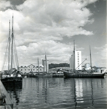 Öland, Borgholm. Parti av hamnen med spannmålssilo och motorseglare.