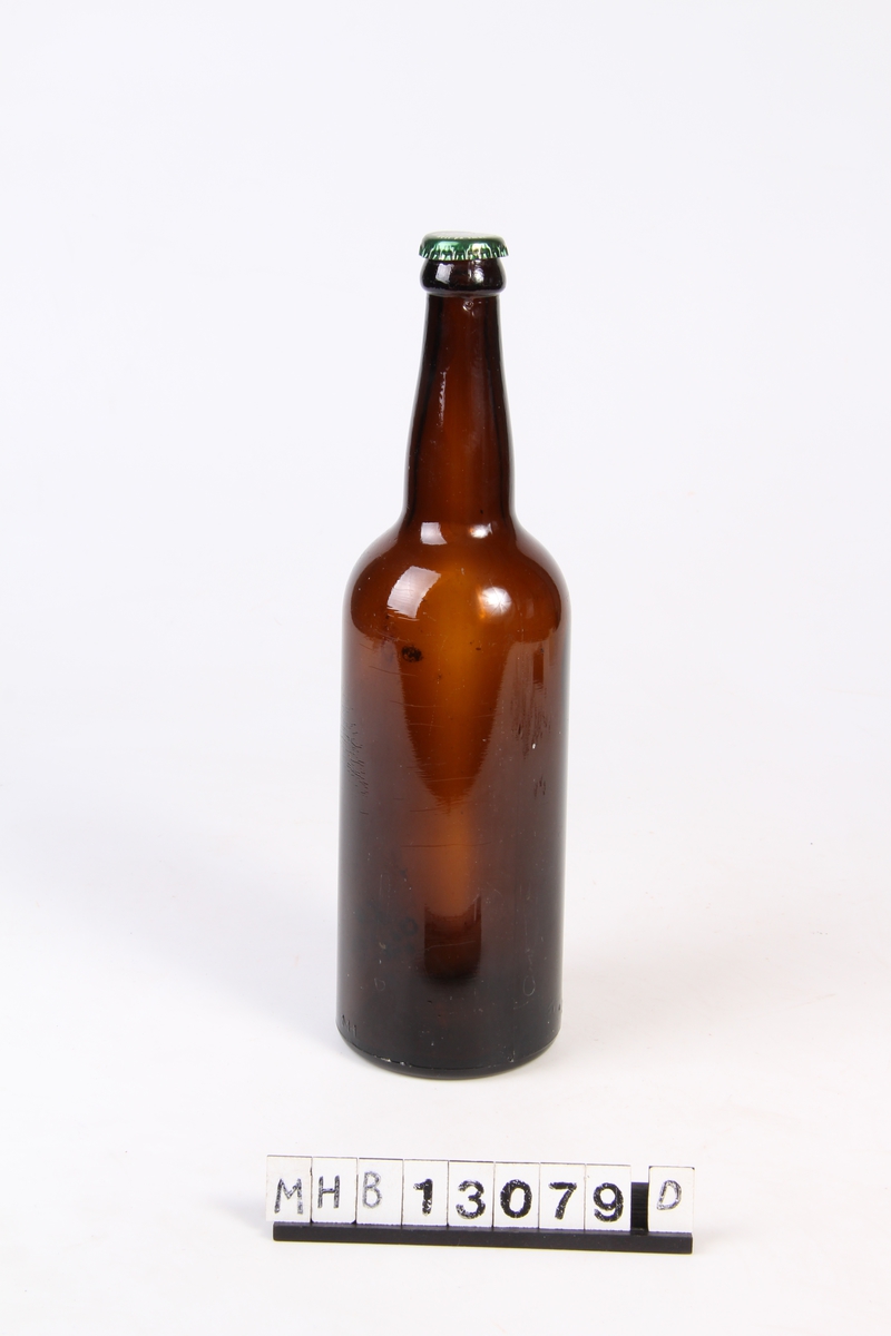 Ølflaske med lokk og etikett