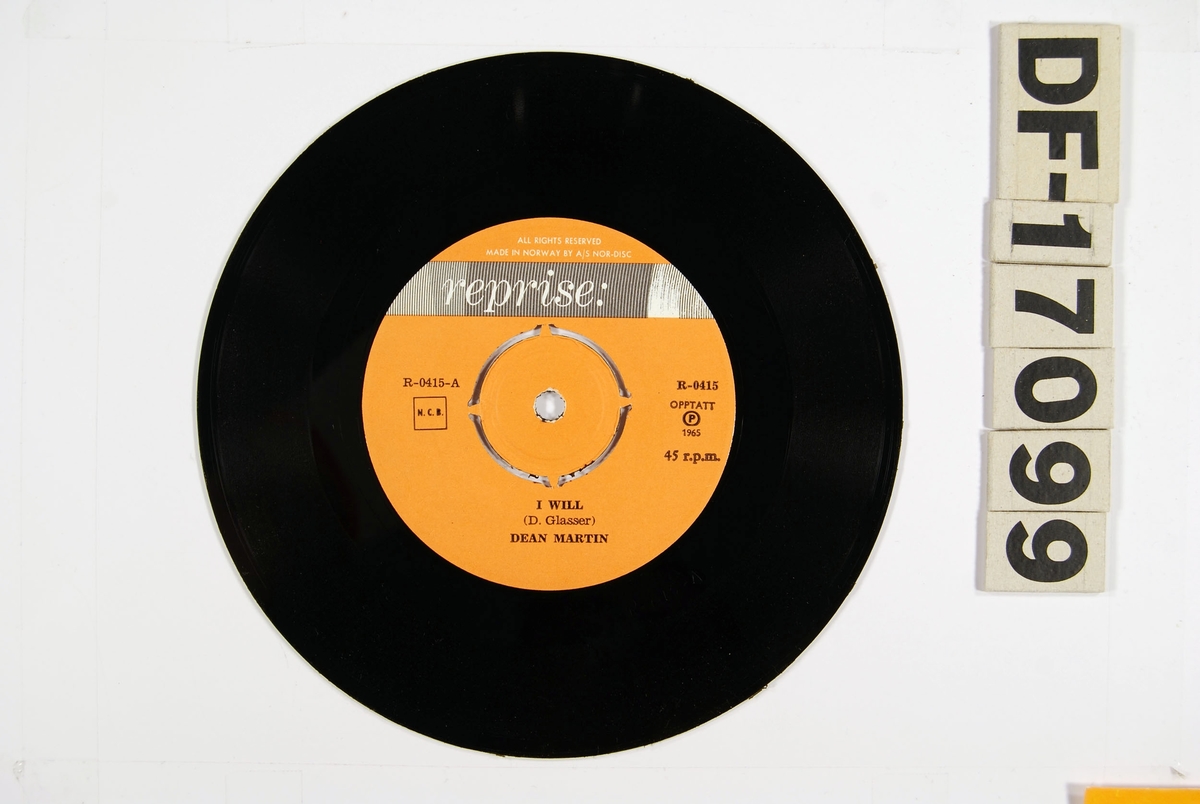 Fotografi av Dean Martin på fremsiden. Baksiden har tekst som ramser opp andre plater fra Reprise Records.