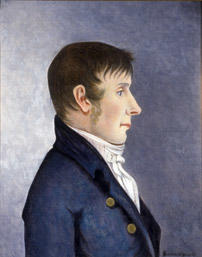 Portrett av Jørgen Aall.  Mann i profil, mørkt, kort hår, kinnskjegg  Mørk blå kledning med to knapper, hvit skjorte (Foto/Photo)