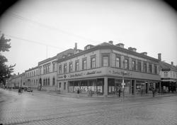 Kjøpmannsgata og Olav Tryggvasons gate med eiendommene til A