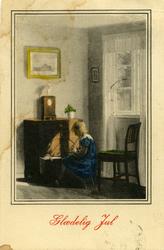 Julekort. Jule-og nyttårshilsen. Interiør stue. En liten jen