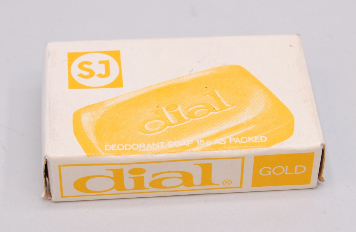 Tvål "dial gold" i pappask med "SJ" tryckt på framsidan. Tvålen är guldgul med texten "dial" på ena sidan.

Modell/Fabrikat/typ: dial