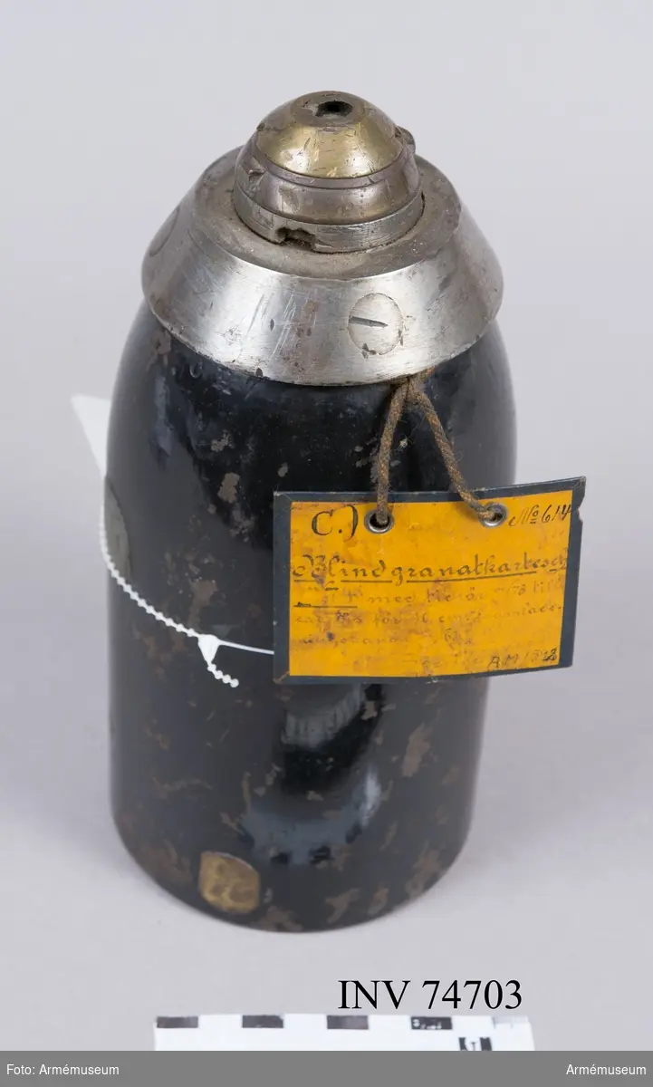 Grupp F:IV.
Blind 10 cm granatkartesch m/1874, exercisammunition för 10 cm framladdningskanon m/1863.