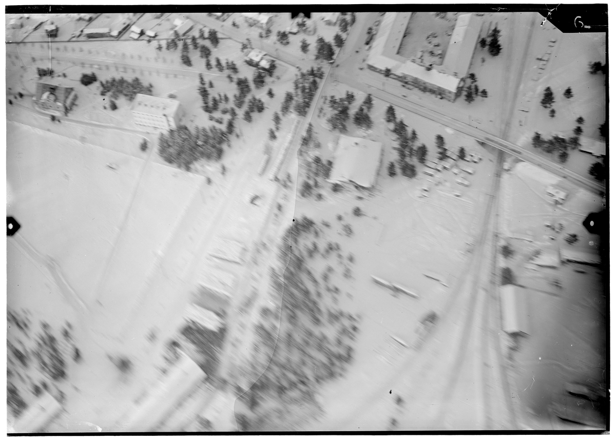 Flygfotografi av delar av Rovaniemi samhälle. Lodbild tagen av flygare vid F 19, Svenska frivilligkåren i Finland under finska vinterkriget, 1940.