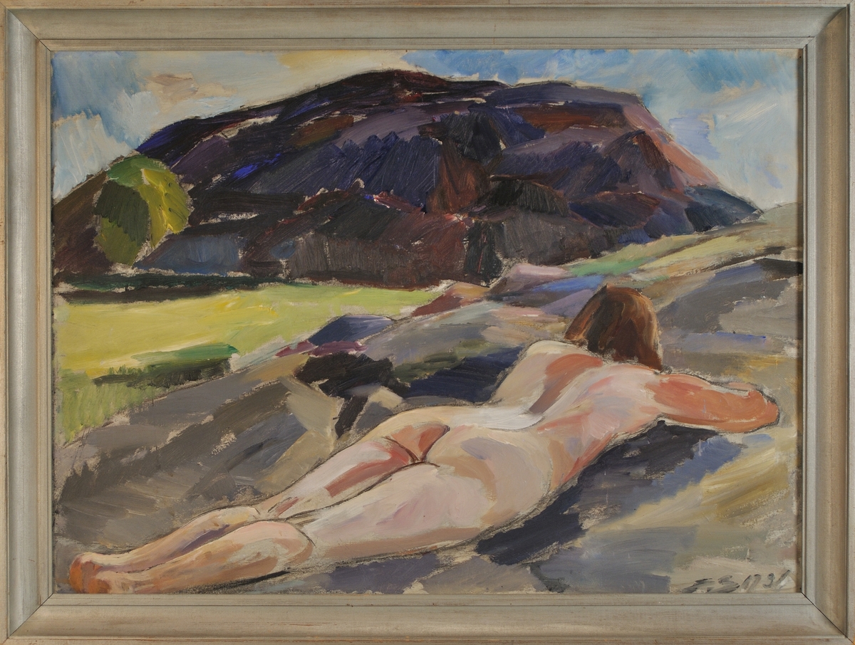 Oljemålning. Naken flicka ligger i förgrunden, i bakgrunden ett berg i motsol.
Motivet från Fiskebäckskil.
Som modell har konstnärens hustru använts.
Påskrift av konstnären a tergo: Evald Björnberg 1931 "Västkustklippor".