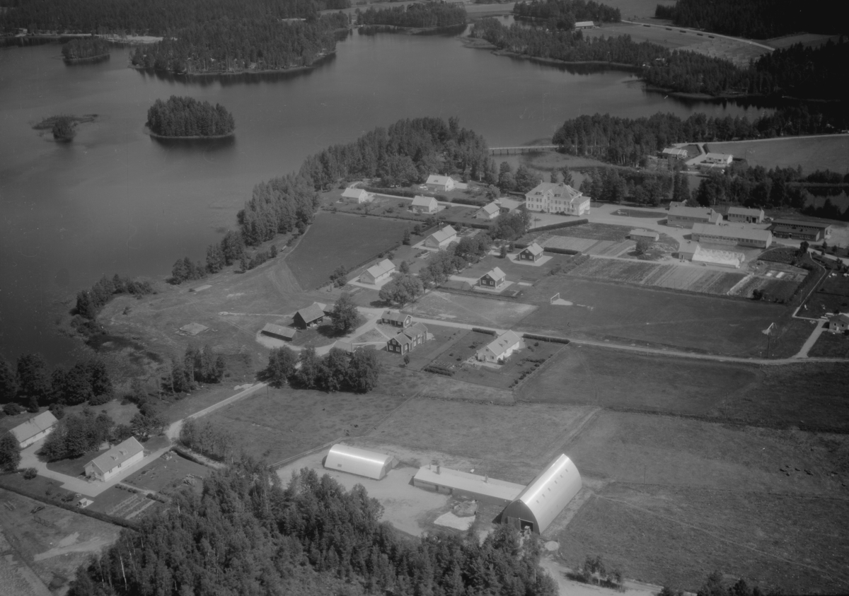 Flygfoto över Långanäs i Eksjö, Jönköpings län. 1266/1966