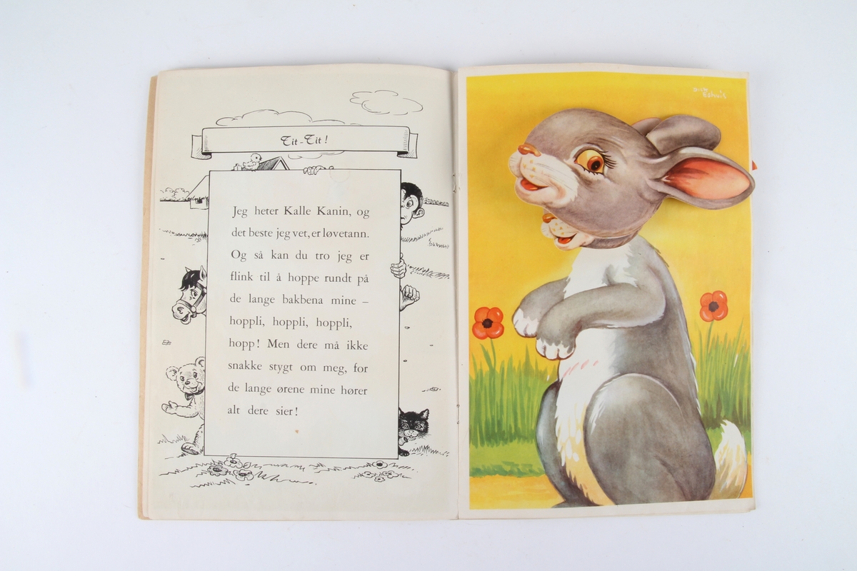 Illustrert barnebok med dyr som har bevegelige hoder.